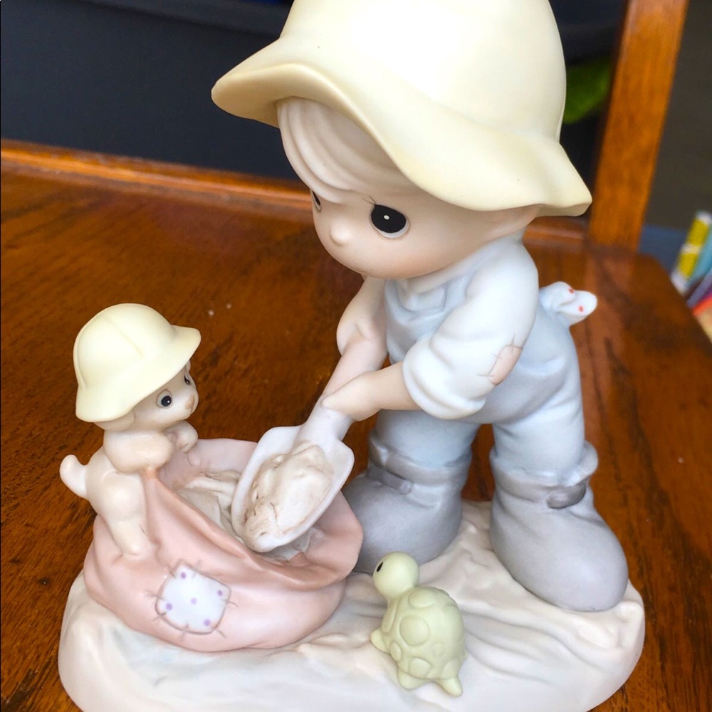 precious moments nothing can dampen the spirit of caring porcelain figurine